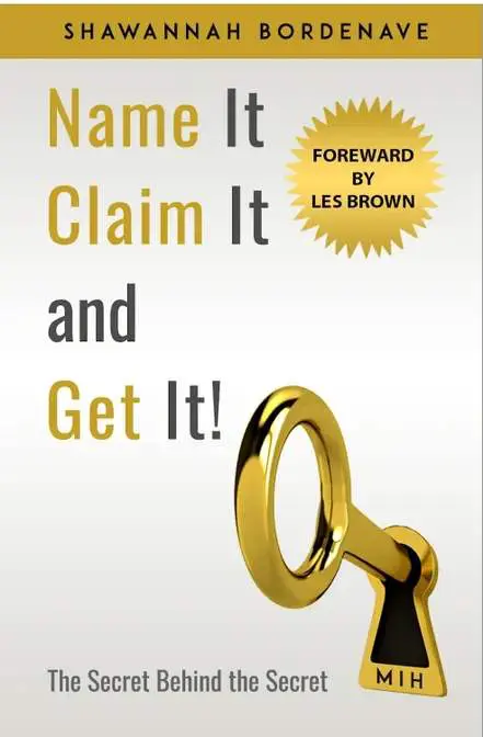 A gold key with the words " name it, claim it and get it !" on top of it.
